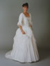 White Polynaise wedding dress.