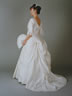 White Polynaise wedding dress.